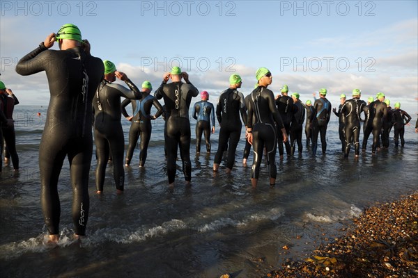 England, West Sussex, Goring-by-Sea, Worthing Triathlon 2009, male competitors at the swim start.