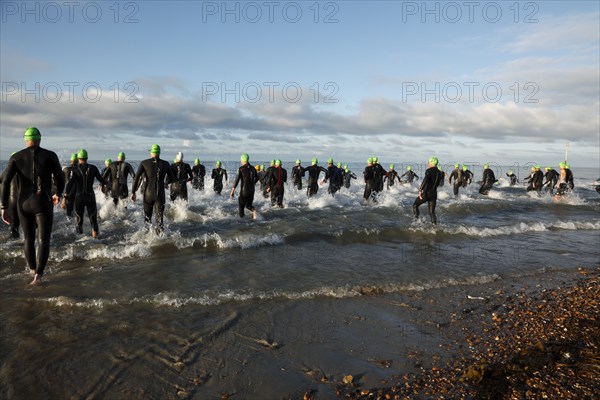 England, West Sussex, Goring-by-Sea,Worthing Triathlon 2009, male competitors at the swim start.