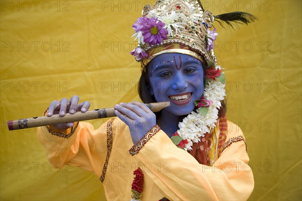 England, London, Hindu Festival, Child dressed as Lord Krishna.