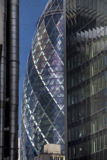 England, London, The City, 30 St Amry Axe, detail of the the Gherkin building.