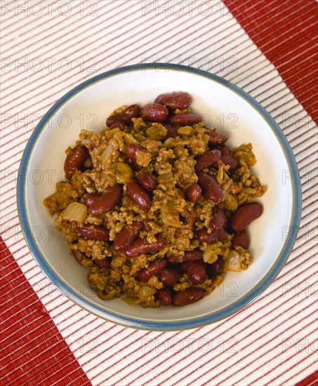 Food, Cooked, Meat, A bowl of Tex Mex chilli con carne with red kidney beans in a bowl on a table.