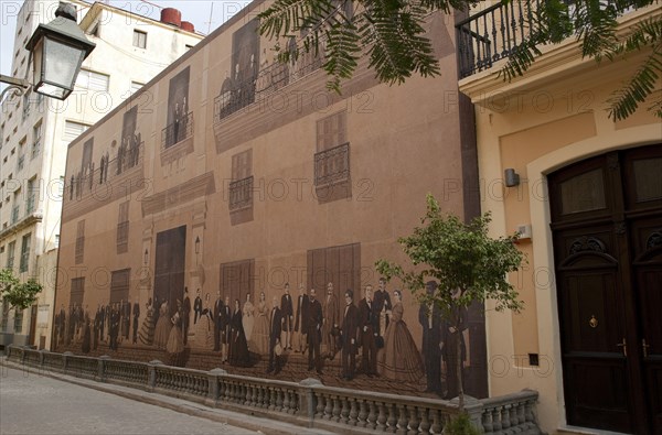 Cuba, Havana, Habana Vieja, Artwork painting made from sand influenced by well known Cuban families covers the wall of building giving almost a three dimensional impression.