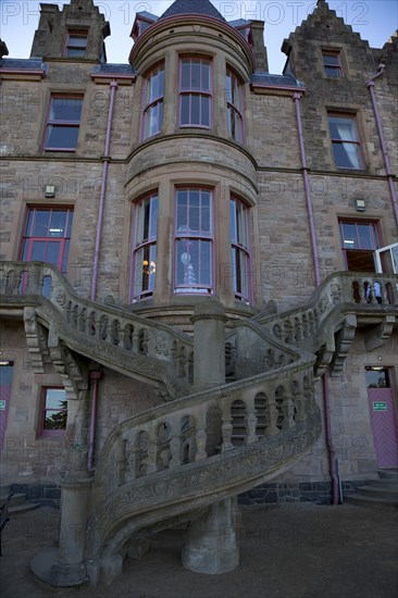 Ireland, North, County Antrim, Belfast Castle over looking the city and Lough. Spiral staircase at the rear popular for weddings.