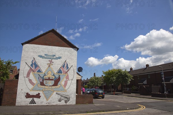 Ireland, North, Belfast, Donegall Pass, Loyalist poltical mural on a gable wall commemorating Reverend Robert Bradford.