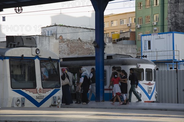 Istanbul, Turkey. Sultanahmet. Istanbul Sirkeci Terminal. Passengers boarding commuter train. Sirkeci is a terminus main station of the Turkish State Railways or TCDD in Sirkeci on the European part of Istanbul. International domestic and regional trains running westwards depart from this station which was inaugurated as the terminus of the Orient Express. Asian Destination Destinations Middle East South Eastern Europe Turkiye Western Asia