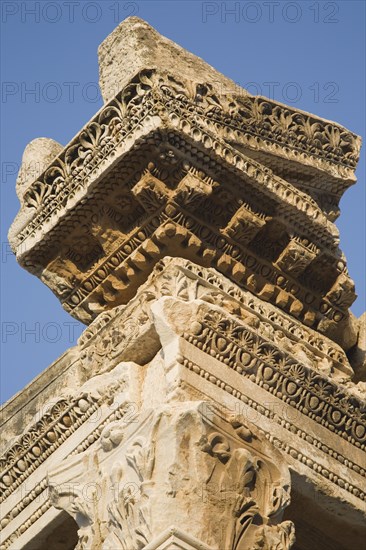 Selcuk, Izmir Province, Turkey. Ephesus. Detail of highly carved stonework in ancient ruined city of Ephesus on the Aegean sea coast. Turkey Turkish Eurasia Eurasian Europe Asia Turkiye Izmir Province Selcuk Ephesus Ruin Ruins Roman Facde Ancient Architecture Masonry Rock Stone Destination Destinations European History Historic Middle East South Eastern Europe Water Western Asia