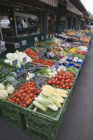 Vienna, Austria. The Naschmarkt. Display of fresh fruit and vegetables in front of shopfronts. Austrian Destination Destinations European Osterreich Viena Western Europe Wien