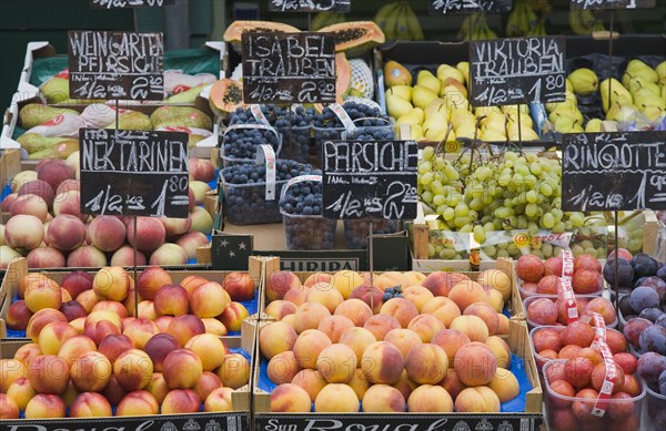 Vienna, Austria. The Naschmarkt. Display of fresh fruit for sale including peaches nectarines blueberries plums and grapes. Austria Austrian Republic Vienna Viennese Wien Europe European City Capital Naschmarkt Market Display Fresh Food Fruit Vegetables Veg Vegetable Stall Shop Store Destination Destinations Osterreich Viena Western Europe