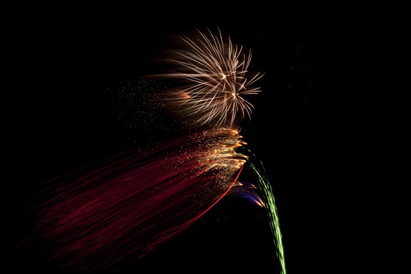 Colourful display of Pyrotechnics. England English UK United Kingdom GB Great Britain British Europe European Festival Festivals Guy Fawkes November Firework Display Fireworks Pyrotechnic Pyrotechnics Pyrotechnical Color Colour Coloured Colored Colourful Colorful Pattern