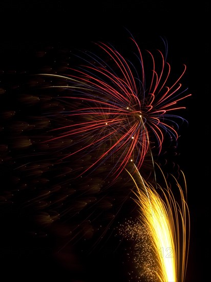 Colourful display of Pyrotechnics. England English UK United Kingdom GB Great Britain British Europe European Festival Festivals Guy Fawkes November Firework Display Fireworks Pyrotechnic Pyrotechnics Pyrotechnical Color Colour Coloured Colored Colourful Colorful Pattern