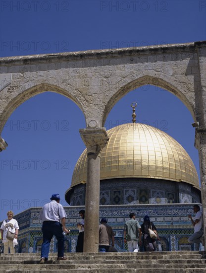 Jerusalem, Israel. Dome of the Rock Mosque part framed by double archway. Blue Sky Sunny Tour Tourists Pray Peaceful Vacation Holiday Steps Colourful Religion Religious Muslim Arabic Israel Jerusalem Dome Rock Mosque Culture Tradition Color Colorful Cultural Cultures Destination Destinations Holidaymakers Islam Isra el Israeli Middle East Moslem Religion Religious Muslims Islam Islamic Tourism Yerushalayim Yisrael