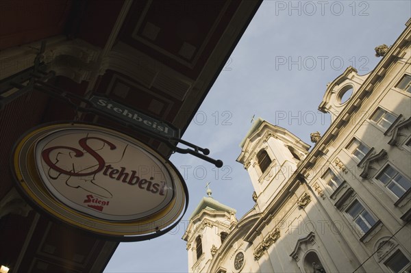 Vienna, Austria. Circular bar sign with Empire era building facade behind. Austria Austrian Republic Vienna Viennese Wien Europe European City Capital Architecture Sign Bar Pub Building Facade Destination Destinations Osterreich Public House Signs Display Posted Signage Viena Western Europe