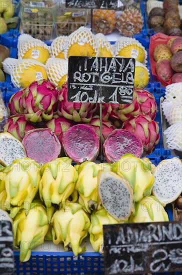 Vienna, Austria. The Naschmarkt. Display of fruit for sale including exotic Dragon Fruit genus Hylocereus also known as sweet pitayas. Austria Austrian Republic Vienna Viennese Wien Europe European City Capital Naschmarkt Market Display Fresh Food Fruit Vegetables Veg Vegetable Stall Shop Store Destination Destinations Osterreich Viena Western Europe