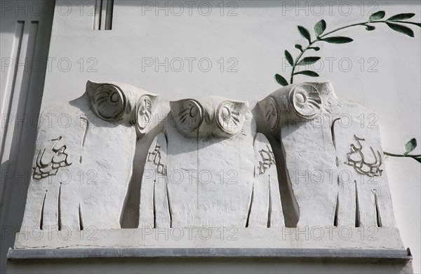 Vienna, Austria. Secession Building. Detail of facade with carved owls in the Jugendstil style attributed to Koloman Moser. Austria Austrian Republic Vienna Viennese Wien Europe European City Capital Architecture Building Detail Exterior Facade Secession Carving Carved Owl Owls Jugenstil Koloman Moser Destination Destinations Osterreich Viena Western Europe