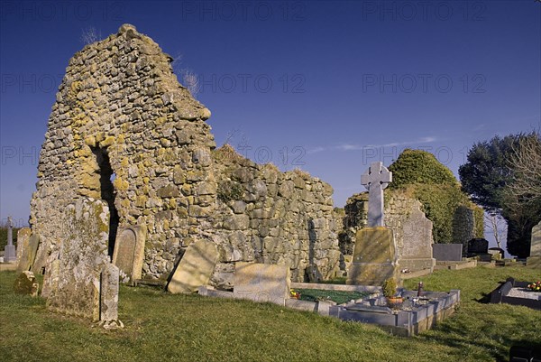 Ardboe, County Tyrone, Ireland. Abbey church ruins. Ireland Irish Eire Erin Europe European Ulster North Northern County Tyrone Ardboe Abbey Church Ruin Ruins Religion Religious Christian Christianity Architecture Stone Walls Blue Color Destination Destinations Gray History Historic Northern Europe Poblacht na hEireann Religion Religious Christianity Christians Republic Colour Grey