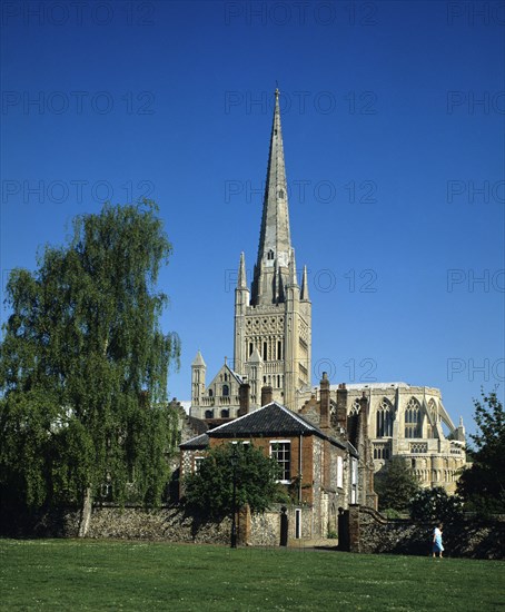 Norwich, Norfolk, England. Cathedral. England English Uk United Kingdom GB Great Britain British Europe European Norfolk Norwich Cathedral Church Architecture Religion Religious Christian Christianity Spire Exterior Steeple Blue Sky British Isles Color Great Britain Northern Europe Religion Religious Christianity Christians United Kingdom Colour