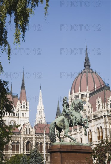 Budapest, Peat County, Hungary. Equestrian statue of Francis II Rakoczi leader of the Hungarian uprising against the Habsburgs 1703 to 1711 outside the Parliament Building. Hungary Hungarian Europe European East Eastern Buda Pest Budapest City Urban Architecture Parliament Building Art Statue Equestrian Francis II Rakoczi Blue Sky Destination Destinations Eastern Europe Parliment