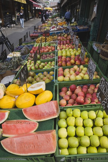 Vienna, Austria. The Naschmarkt. Display of melon and apples for sale on fresh fruit stall in market. Austria Austrian Republic Vienna Viennese Wien Europe European City Capital Naschmarkt Market Display Fresh Food Fruit Stall Shop Store Destination Destinations Osterreich Viena Western Europe