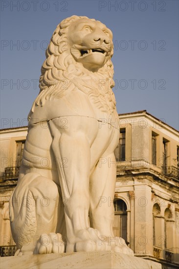 Samos Island, Northern Aegean, Greece. Vathy. Lion statue in Pythagoras Square set up in 1930 to mark the centenary of the uprising against the Ottoman Turkish overlords. Greece Greek Europe European Vacation Holiday Holidays Travel Destination Tourism Ellas Hellenic Northern Agean Samos Island Vathy Architecture Art Statue Stone Carved Lion Pythagoras Square Destination Destinations Ellada History Historic Southern Europe