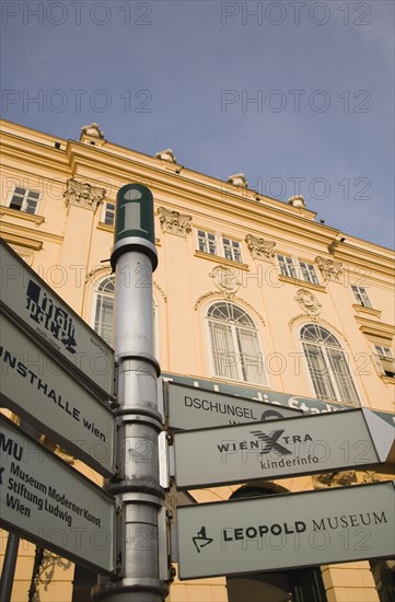 Vienna, Austria. Tourist signpost at MUMOK the Museum Moderner Kunst or Museum of Modern Art located in the Museumsquartier in Vienna. Austrian Republic Vienna Viennese Wien Europe European City Capital Mumok Sign Information Architecture Modern Art Museumsquartier Modener Kunst Direction Tourist Blue Destination Destinations Osterreich Sightseeing Signs Display Posted Signage Tourists Viena Western Europe