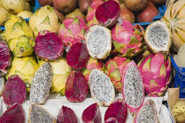 Vienna, Austria. The Naschmarkt. Dragon Fruit for sale on market stall. Genus Hylocereus sweet pitayas. Austria Austrian Republic Vienna Viennese Wien Europe European City Capital Naschmarkt Market Display Fresh Food Fruit Stall Shop Store Dragon Color Destination Destinations Osterreich Viena Western Europe