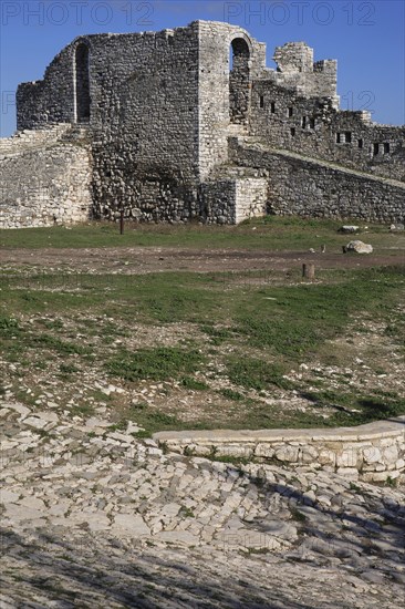 Berat, Albania. Castle ruined stone fortifications. Albanian Shqip‘ria Southern Europe Albania Albanian Republic Europe European Travel Destination Indo European Berat Castle Fort Fortified Fortifications Stone Walls Battlements Blue Castillo Castello Color Destination Destinations Gray History Historic