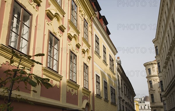 Vienna, Austria. Renovated exterior facades of pastel painted buildings. Austria Austrian Republic Vienna Viennese Wien Europe European City Capita Architecture Buildings Facade Renovated Restored Pastel Street Color Destination Destinations Osterreich Viena Western Europe