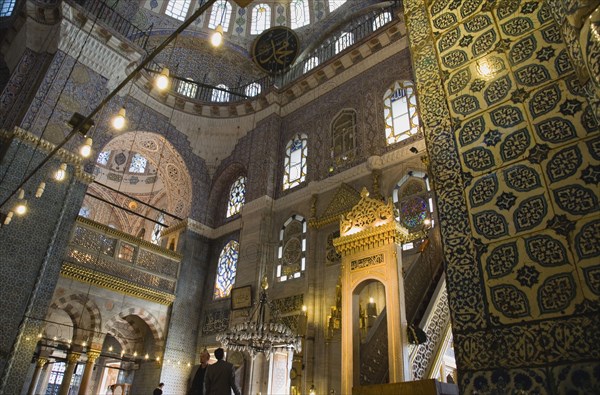 Istanbul, Turkey. Sultanahmet. The New Mosque or Yeni Camii. Tiled and highly decorated interior. Turkey Turkish Istanbul Constantinople Stamboul Stambul City Europe European Asia Asian East West Urban Destination Travel Tourism Sultanahmet New Mosque Yeni Camii Interior Muslim Moslem Islam Islamic Religion Religious Destination Destinations Middle East Religion Religious Muslims Islam Islamic South Eastern Europe Turkiye Western Asia