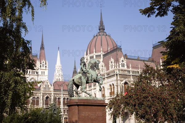 Budapest, Pest County, Hungary. Equestrian statue of Francis II Rakoczi leader of the Hungarian uprising against the Habsburgs 1703 to 1711 outside the Parliament Building. Hungary Hungarian Europe European East Eastern Buda Pest Budapest City Urban Architecture Parliament Building Art Statue Equestrian Francis II Rakoczi Blue Sky Destination Destinations Eastern Europe Parliment