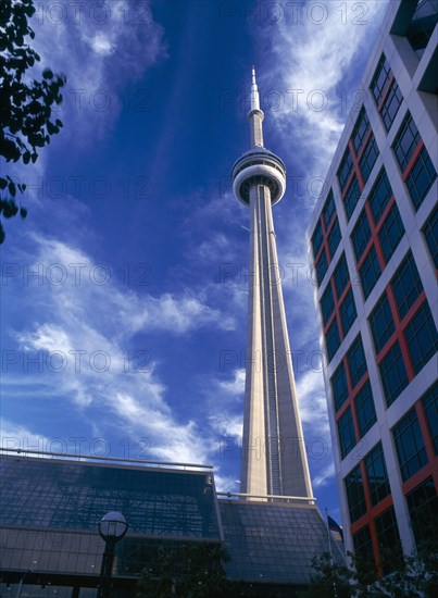 Toronto, Ontario, Canada. The CN Tower. 553.33 metre high concrete communications tower with vistor viewing platforms and revolving restaurant. view from Front Street. Canadian National American Blue Meter North America Northern