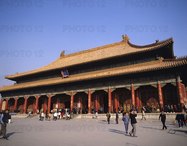 Beijing, China. Forbidden City with tourists. China Chinese Beijing Peking Forbidden City Asia Asian Architecture Architetcural History Historical Exterior Facade Tourist Tourists Tourism Travel Red Blue Sky People Group Crowd Traditional Chungkuo Classic Classical Destination Destinations History Historic Holidaymakers Jhongguo Older Sightseeing Zhongguo