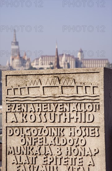 Budapest, Pest County, Hungary. Kossuth Bridge WWII Memorial. The Kossuth Bridge or Kossuth hid was a bridge over the River Danube in Budapest from 1945 to 1960 errected after the Soviet Red Army took Budapest in early 1945 and found all the citys seven bridges had been demolished by retreating Nazi troops. Hungary Hungarian Europe European East Eastern Buda Pest Budapest City Urban Kossuth Memorial Carved Stone Bridge River Danube 7 Destination Destinations Eastern Europe History Historic