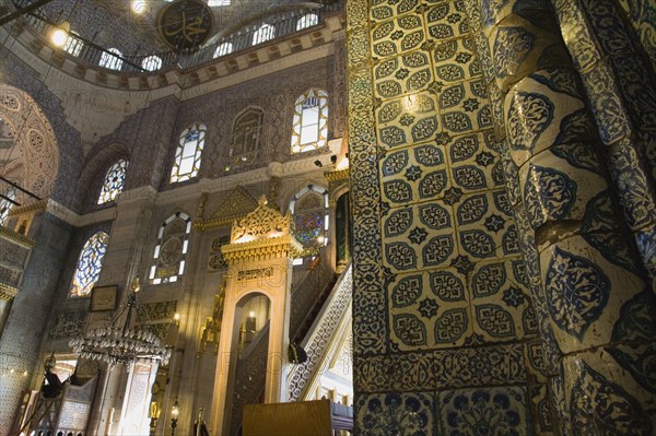 Istanbul, Turkey. Sultanahmet. The New Mosque or Yeni Camii. Tiled and highly decorated interior. Turkey Turkish Istanbul Constantinople Stamboul Stambul City Europe European Asia Asian East West Urban Destination Travel Tourism Sultanahmet New Mosque Yeni Camii Interior Muslim Moslem Islam Islamic Religion Religious Destination Destinations Middle East Religion Religious Muslims Islam Islamic South Eastern Europe Turkiye Western Asia