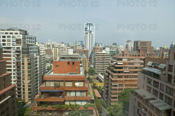 Santiago, Chile. Multistorey apartment blocks with wide balconies and greenery in the upmarket neighbourhood of Vitacura. Chile Chilean South America American Hispanic Santiago City Cityscape Urban Buildings Aerial Elevated View Apartment Blocks Apartments Flats Tower Housinig Luxury Vitacura District Destination Destinations Flat Latin America Latino South America Southern