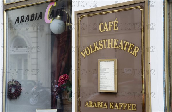 Vienna, Austria. Sign and menu beside window of cafe adjacent to the Volkstheater. Austria Austrian Republic Vienna Viennese Wien Europe European City Capital Sign Signs Restaurant Cafe Menu Architecture Detail Volkstheatheter Bar Bistro Destination Destinations Osterreich Signs Display Posted Signage Viena Western Europe