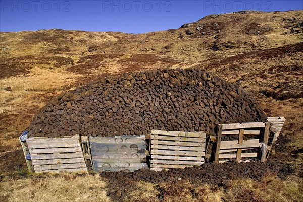 Glengesh Pass, County Donegal, Ireland. Turf Stack in barren landscape. Ireland Irish Eire Erin Europe European County Donegal Glengash Turf Stack Pile Drying Fuel Peat Blue Sky Ecology Entorno Environmental Environnement Green Issues Northern Europe Poblacht na hEireann Republic Scenic