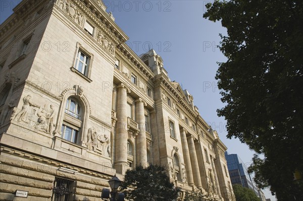 Budapest, Pest County, Hungary. Angled exterior facade of renovated building. Hungary Hungarian Europe European East Eastern Buda Pest Budapest City Architecture Buildings Facade Exterior Renovated Restored Blue Destination Destinations Eastern Europe