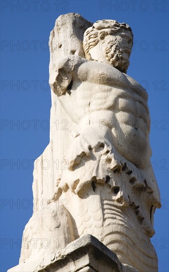 Athens, Attica, Greece. Ancient Agora. Giants statue cropped view of classical male figure with muscled torso. Greece Greek Attica Athens Agora Ancient Statue Figure Male Art Architecture Europe European Vacation Holiday Holidays Travel Destination Tourism Ellas Hellenic Atenas Athenes Blue Color Destination Destinations Ellada History Historic Southern Europe