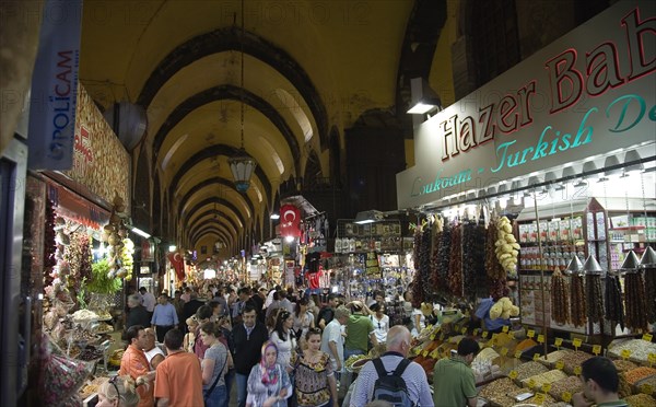 Istanbul, Turkey. Sultanahmet. The Spice Bazaar or Egyptian Bazaar one of the oldest bazaars in the city and the second largest covered shopping complex after the Grand Bazaar. Turkey Turkish Istanbul Constantinople Stamboul Stambul City Europe European Asia Asian East West Urban Destination Travel Tourism Sultanahmet Spice Bazaar Market Shop Store Stall Interior Crowd Crowded Shoppers Tourists 1 Destination Destinations Holidaymakers Middle East Shops Shoppers Mall Retail Buy Buying Market Markets Single unitary South Eastern Europe Turkiye Western Asia