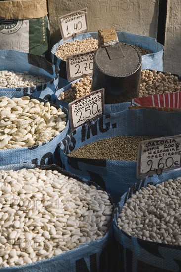 Athens, Attica, Greece. Sacks of beans for sale displayed on market food stall. Greece Greek Europe European Vacation Holiday Holidays Travel Destination Tourism Ellas Hellenic Attica Athens Market Beans Central Pulses Dried Goods Food Sacks Price Card Prices Atenas Athenes Destination Destinations Ellada Southern Europe