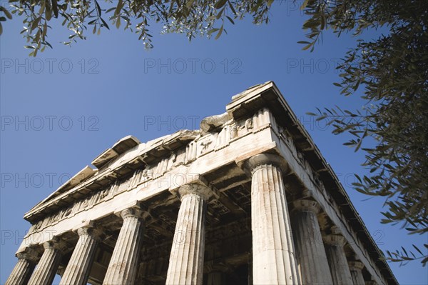 Athens, Attica, Greece. Temple of Hephaestus part view of eastern face. Greece Greek Attica Athens Temple Hephaestus Tourist Europe European Vacation Holiday Holidays Travel Destination Tourism Ellas Hellenic Ancient Ruin Ruins Column Columns Atenas Athenes Blue Destination Destinations Ellada History Historic Sightseeing Southern Europe Tourists