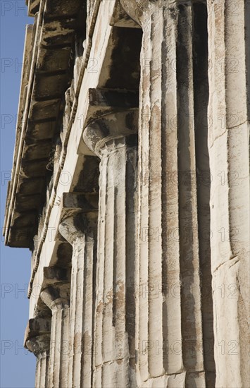 Athens, Attica, Greece. Part view of columns along eastern face of the Temple of Hephaestus. Greece Greek Attica Athens Temple Hephaestus Tourist Europe European Vacation Holiday Holidays Travel Destination Tourism Ellas Hellenic Ancient Ruin Ruins Column Columns Atenas Athenes Destination Destinations Ellada History Historic Sightseeing Southern Europe Tourists