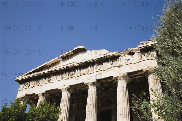 Athens, Attica, Greece. Part view of ruined portico and columns of eastern face of the Temple of Hephaestus. Greece Greek Attica Athens Temple Hephaestus Tourist Europe European Vacation Holiday Holidays Travel Destination Tourism Ellas Hellenic Ancient Ruin Ruins Column Columns Blue Sky Atenas Athenes Destination Destinations Ellada History Historic Sightseeing Southern Europe Tourists