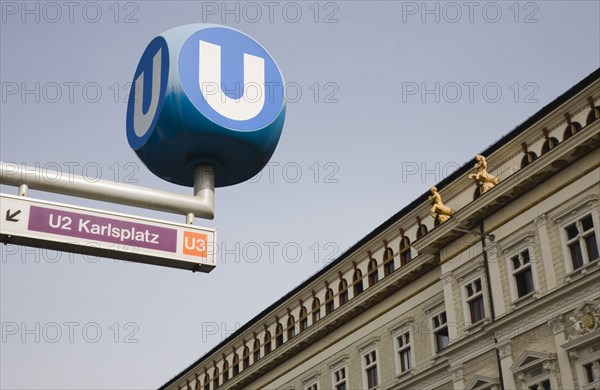 Vienna, Austria. Neubau District. The Vienna U Bahn sign for the Untergrundbahn or underground railway. White letter U on circular blue background. Austria Austrian Republic Vienna Viennese Wien Europe European City Capital Sign Signs Transport Underground Subway U Bahn Station Untergrundbahn Color Destination Destinations Osterreich Roundel Signs Display Posted Signage Viena Western Europe