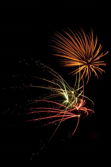 Colourful display of Pyrotechnics. England English UK United Kingdom GB Great Britain British Europe European Festival Festivals Guy Fawkes November Firework Display Fireworks Pyrotechnic Pyrotechnics Pyrotechnical Color Colour Coloured Colored Colourful Colorful Pattern