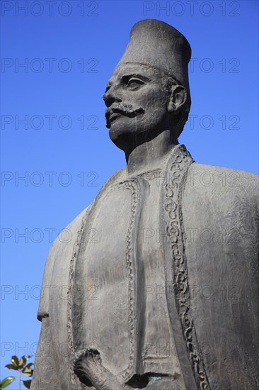 Tirana, Albania. Statue of male figure. Albanian Shqip‘ria Southern Europe Albania Albanian Republic Europe European Travel Destination Indo European Art Tirana Tirane City Capital Architecture Statue Man Male Figure Blue Sky Color Destination Destinations Gray Male Men Guy