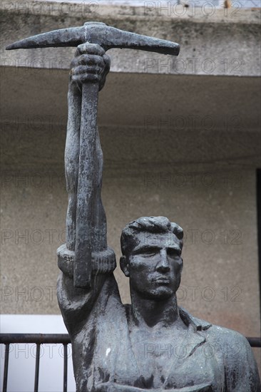 Tirana, Albania. Statue of communist worker holding pickaxe. Albanian Shqip‘ria Southern Europe Albania Albanian Republic Europe European Travel Destination Indo European Tirana Tirane Art Architecture Revolutionary Communist Male man Figure Worker Statue Pick Pickaxe Color Destination Destinations Gray Male Men Guy