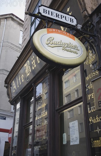 Vienna, Austria. Angled view of pub facade with hanging beer signs. Austria Austrian Republic Vienna Viennese Wien Europe European City Capital Architecture Building Exterior Facade Traditional Signs Signs Sinage Restaurant Bar Pub Bier Beer Bierpub Classic Classical Destination Destinations Historical Older Osterreich Public House Viena Western Europe