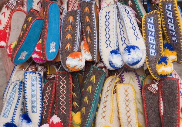 Athens, Attica, Greece. Traditional footwear on sale in the Plaka district lying just beneath the Acropolis. Greece Greek Europe European Vacation Holiday Holidays Travel Destination Tourism Ellas Hellenic Attica Athens Plaka Markets Shoes Slippers Tradtional Footwear Tourist Shop Stall Store Display Pattern Atenas Athenes Classic Classical Destination Destinations Ellada Historical Older Sightseeing Southern Europe Tourists