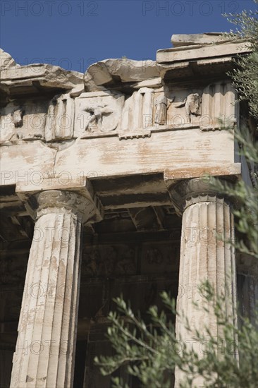 Athens, Attica, Greece. Part view of ruined portico and columns of eastern face of the Temple of Hephaestus. Greece Greek Attica Athens Temple Hephaestus Tourist Europe European Vacation Holiday Holidays Travel Destination Tourism Ellas Hellenic Ancient Ruin Ruins Column Columns Portico Atenas Athenes Blue Destination Destinations Ellada History Historic Sightseeing Southern Europe Tourists